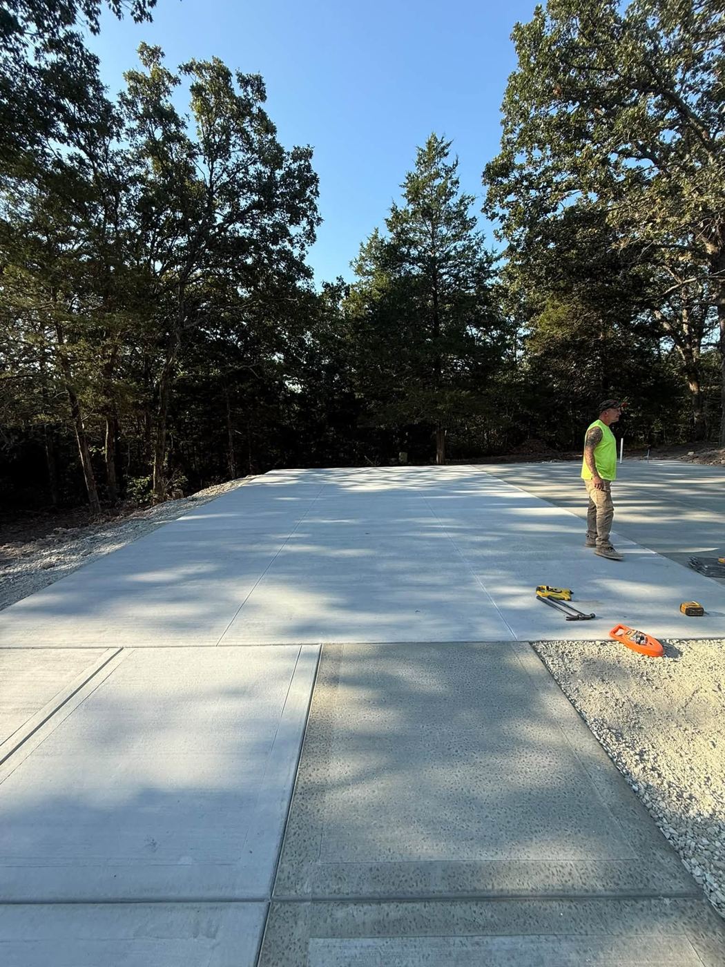 Wide shop slab with crew member standing on it